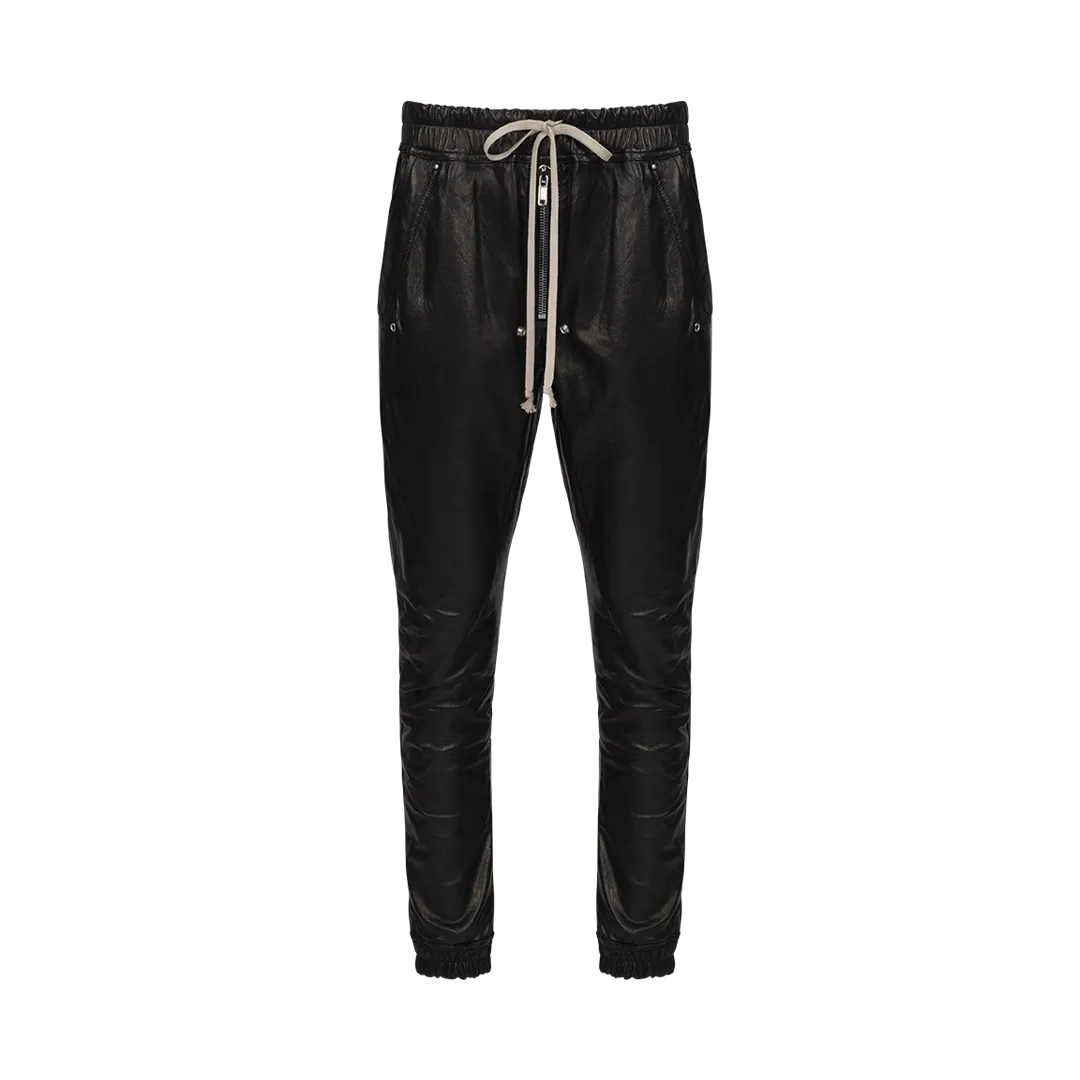 Sure! Optimizing a product title for e-commerce involves adding descriptive modifiers that highlight key features, materials, and potential uses. Here’s an optimized title for “Bela Leather Joggers”:

Bela Premium Black Leather Joggers with Elastic Waistband for Men and Women - Stylish and Comfortable

This title includes descriptive modifiers such as Premium, Black, and Elastic Waistband, which help attract specific customer interest and improve searchability. Adjustments can be made based on the actual product details or the audience focus.